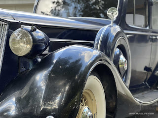 Spare tires in fenders make this a six wheel 1936 Packard