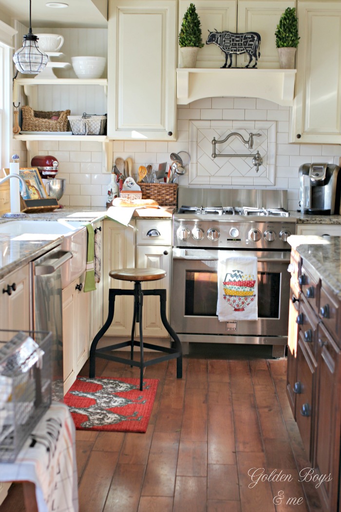 DIY farmhouse style kitchen with mantel hood , subway tile backsplash, open shelving and pot filler - www.goldenboysandme.com