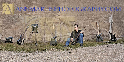 Dallas and Frisco Texas senior pictures portraits photographers photography with high school senior boy and multiple guitars urban pose