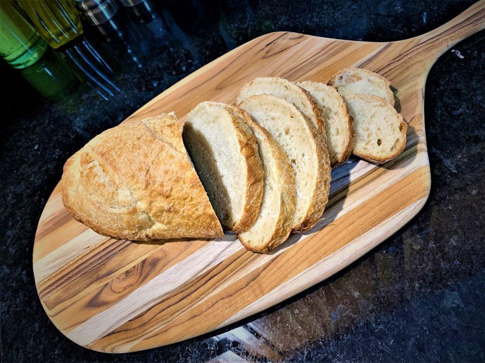 Freshly baked and sliced sourdough bread