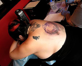Design Tattoos on Hinder Woman