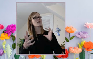 a light-skinned woman signing, inserted into a background of flowers