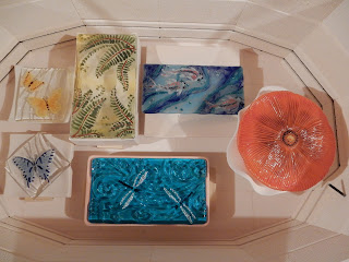 Ready to slump. The rectangular koi platter was  centered on top of the square mold and fired.