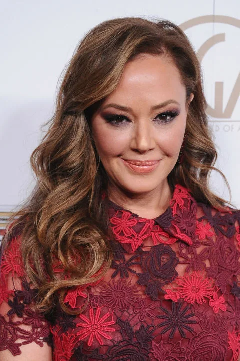 A classic combo: medium-brown hair and warm, not-quite-blonde highlights. No wonder it's a favorite of Leah Remini and so many other salon-goers!