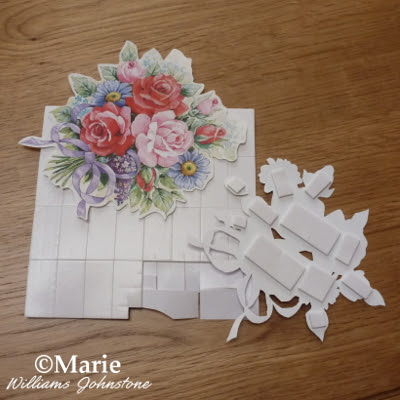 Using sticky foam pads to layer up designs for the paper tole paper craft