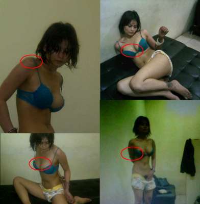 FOTO BUGIL NOVIE AMELIA HANYA MENGGUNAKAN CD DAN BH TANGAN DI BORGOL