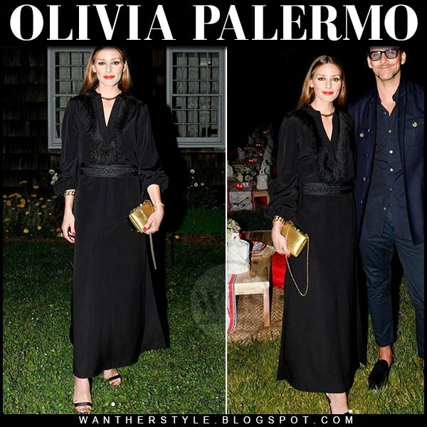 Olivia Palermo in black shirt, black belt and black skirt