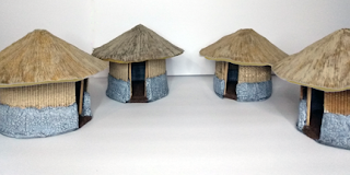 Four finished huts