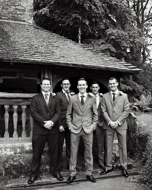 groom and groomsmen outside St Leonards in Bursledon