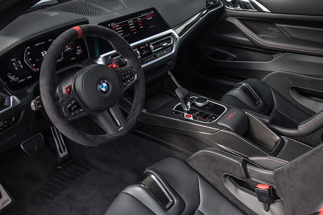 2023 BMW M4 CSL - M Alcantara steering wheel and Merino leather interior.