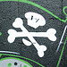 Thumbnail photo of a grafitti skull and crossbones