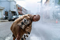 Eduardo Velev cools off in the spray of a fire hydrant in Philadelphia during a July 2018 heat wave. Scientists say last summer's extreme heat across the Northern Hemisphere wouldn’t have happened without human-induced climate change. (Credit: Jessica Kourkounis/Getty Images )Click to Enlarge.