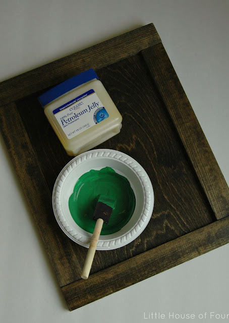 A perfectly distressed DIY memo board using Vaseline!