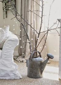 Arboles de navidad hechos con ramas secas
