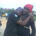 A Policeman appreciating a local Vigilante that rescued him from kidnappers in Rivers state.