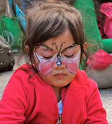 This is Asha with her butterfly face painting.