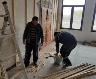 Halil cuts some battens to size