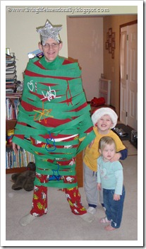 Daddy as a Christmas tree - he's a great sport!