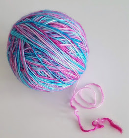 Click to see the start of a gorgeous knitted shawl made with hand-dyed yarn.