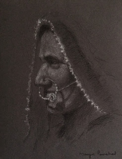 Portrait sketching of a woman on toned paper by Manju Panchal