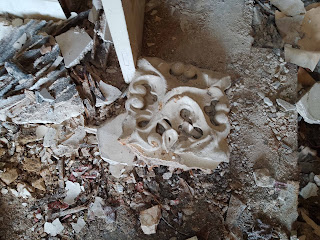 <img src="img_18th century mansion in Todmorden.jpg" alt="Image of  discarded ornate plaster work">