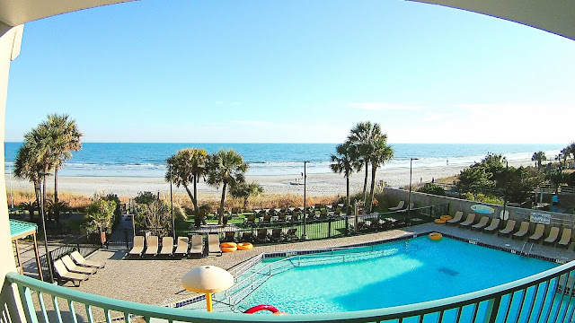 View of beach from condo balcony