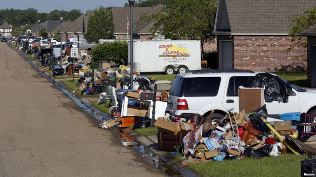 Louisiana Flood Victims Work Together to Survive.