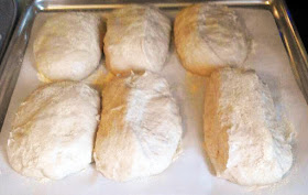 Ciabatta dough cut into six rolls
