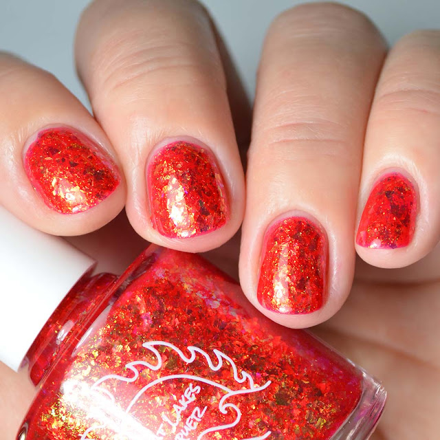 red flakie nail polish four finger swatch