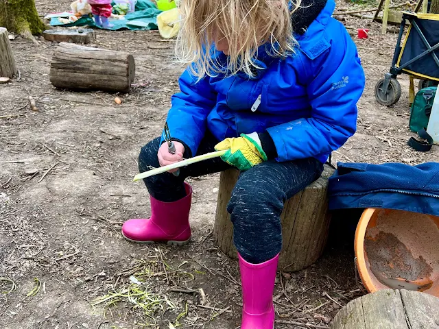 Learning to whittle at a forest school session in Loughton