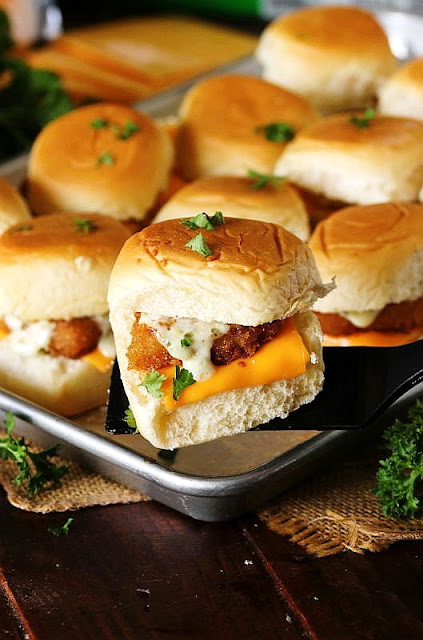 Serving a Filet-O-Fish Slider with a Spatula Image