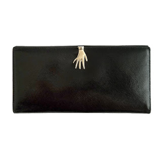 Vintage 1950's black Gucci clutch with metallic hand closure.