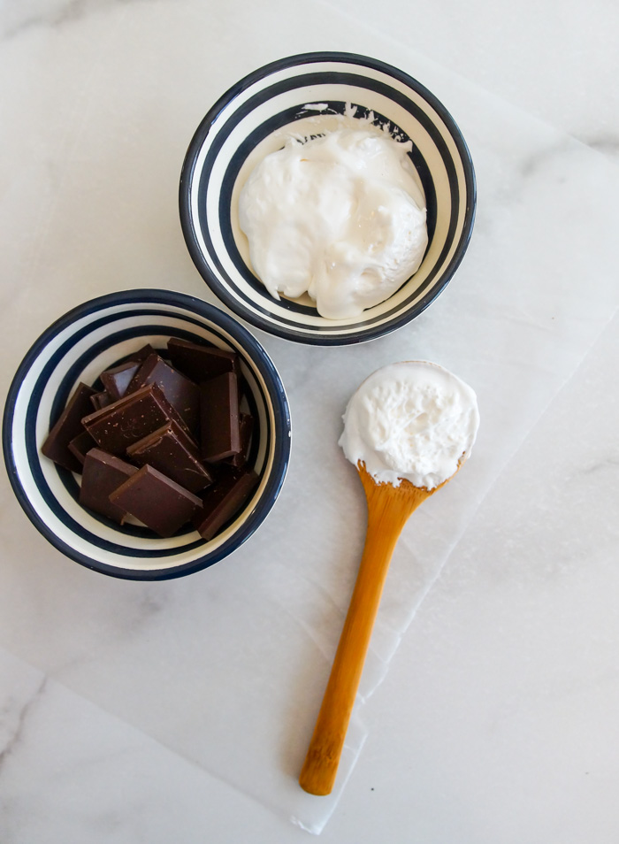 chocolate and marshmallow cream in navy and white stiped bowls