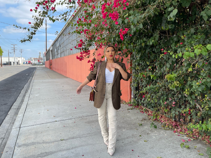 woman wearing  a thrifted mens blazer