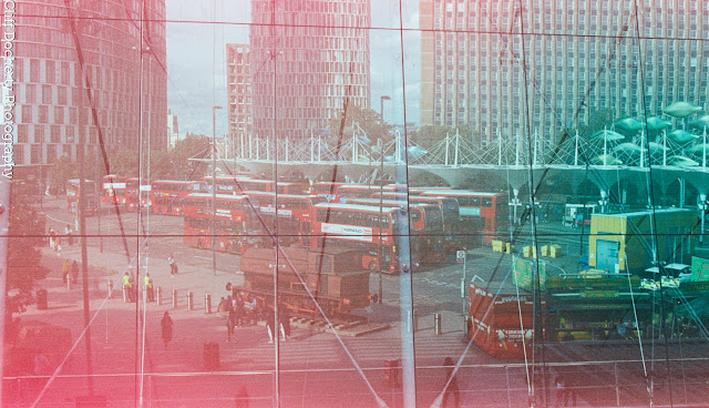 Photo of Stratford Bus Station Reflected In A Window