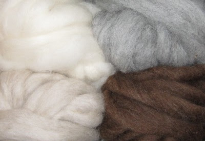 4 samples of Shetland rovings in different colors.