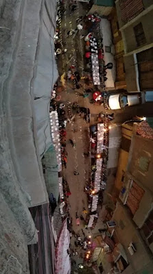 أهالي شارع مكه ينظمون مائدة إفطار عين شمس بالجهود الذاتية
