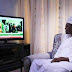  Photo of President Buhari watching the news
