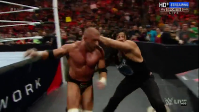 Roman Reigns destroys Triple H in  RAW 14/03/16