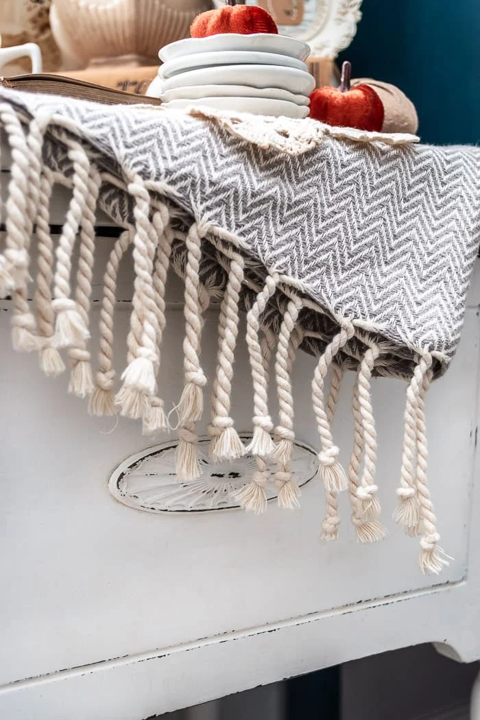 blanket with tassels, white vintage sewing machine