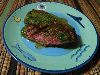 Lamb Chop on Plate Covered with Mint Sauce