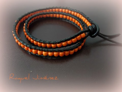 PULSERA CHAN LUU NARANJA Y CUERO NEGRO