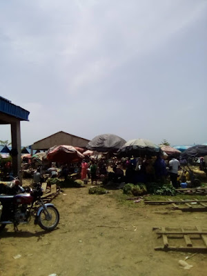 The street market in Abuja, "library news broadcast", Abuja lockdown: a living hell, Light Obi-Ogbonnia, Light Obi Ogbonnia, Ligh Obi Ogbonnia, Nigeria, Cecylia  Buczko