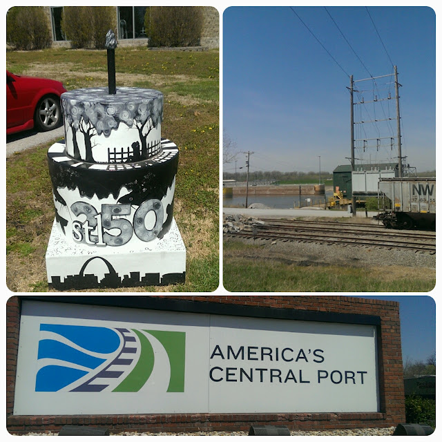 A collage of three images representing St. Louis transportation. The first is a black and white cake sculpture with a candle in memory of St. Louis's 250th Anniversary. The second is a picture of the riverfront with train tracks, railroad cars, and a power station behind them. The final image shows a sign reading "America's Central Port" in bold, black letters on a brick wall.