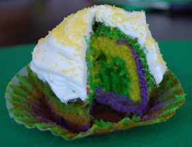 Surprise inside the striped Mardi Gras cupcakes