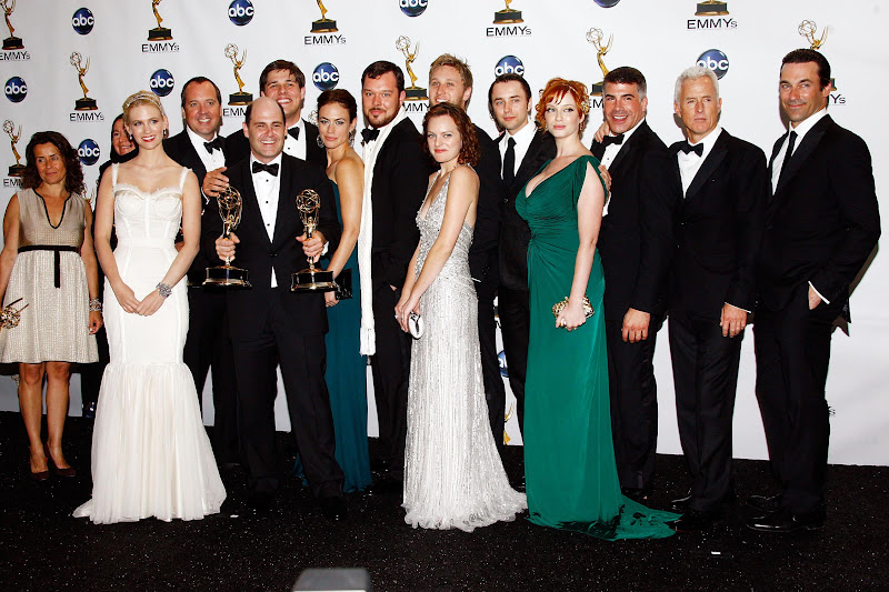 Producer/writer Matthew Weiner (5th from L) poses in the press room with the Emmy for Best Drama Series for "Mad Men" during the 60th Primetime Emmy Awards held at Nokia Theatre on September 21, 2008 in Los Angeles, California.