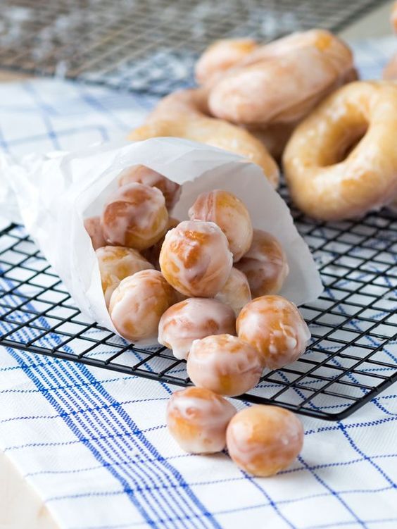 These original glazed donuts are light and chewy and a good way to get anyone out of bed in the morning. Who can resist a Krispy Kreme recipe copycat?