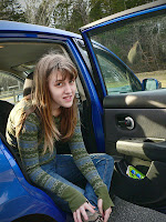 girl sitting in a car.