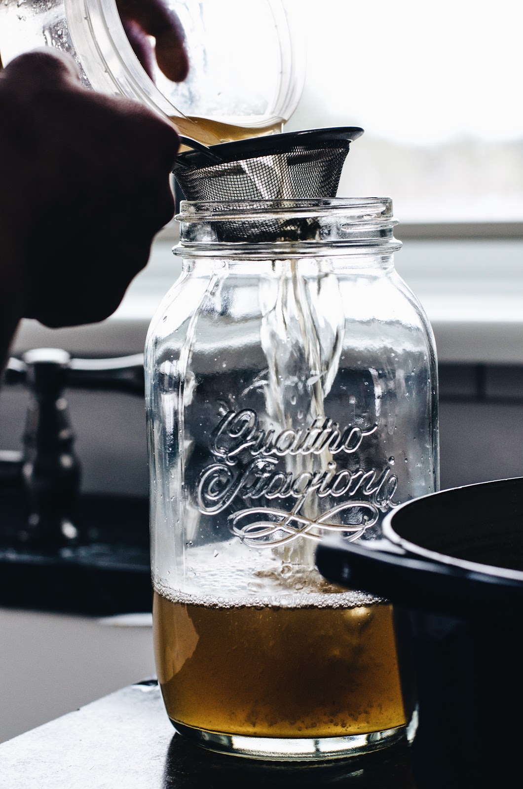 Straining Homemade Chicken Stock