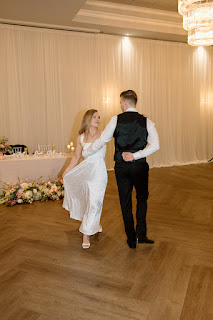 bride and groom enter dance floor to perform first dance at abernethy center oregon city